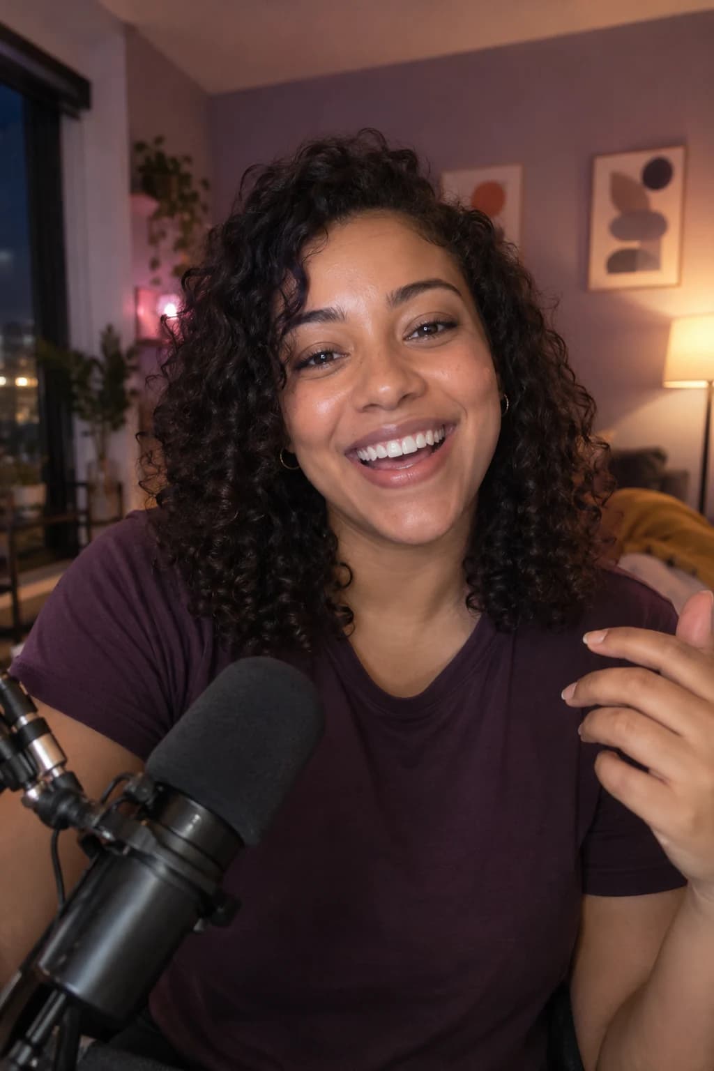 Creator speaking to a LIVE audience at a microphone in her home studio